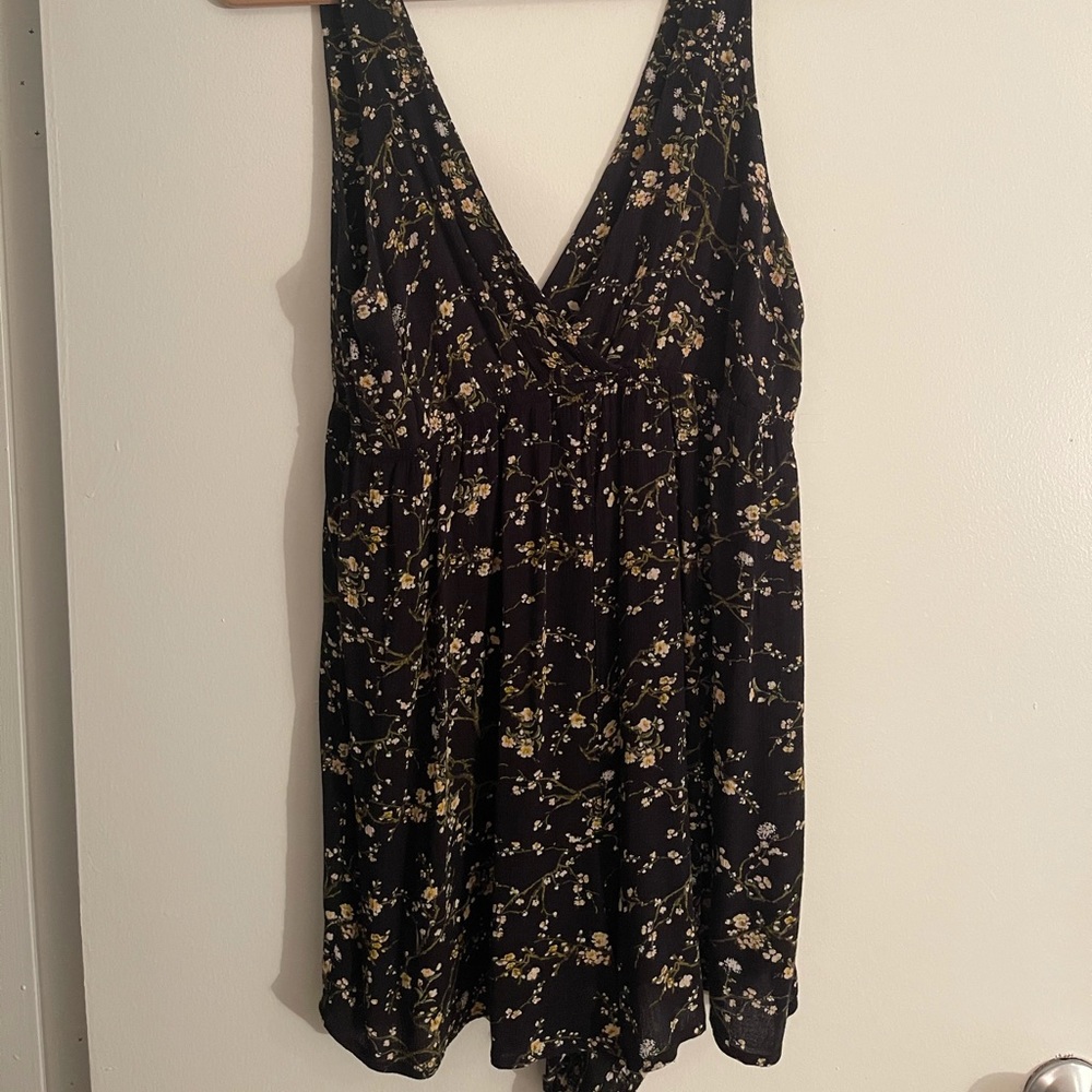 Size XL black romper with floral design